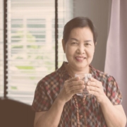 woman holding glass 1 35cd071e9ca4c32deccc2a1bb525c3d3